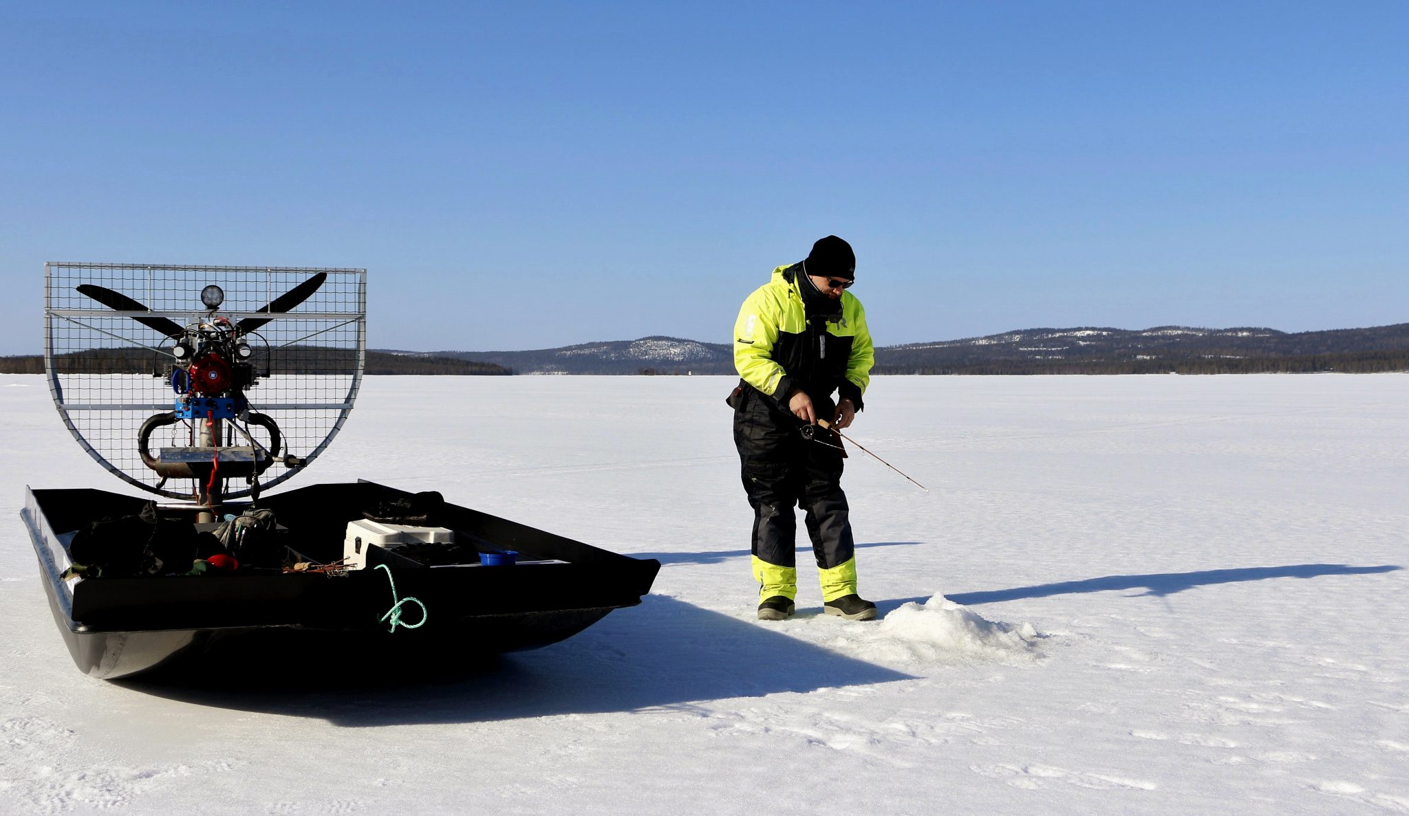 Photo: winter fishing ice fishing images. Lapland Wild Fish Finland Pello