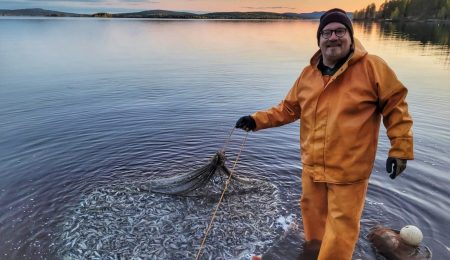 Sustainable commercial fishing on lake Miekojärvi in the Arctic Circle - open water time